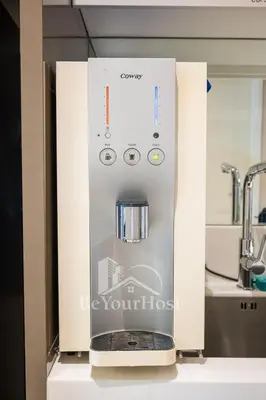 a coffee machine sitting on top of a counter at Dorsett Residences Sri Hartamas [5 Star Suites] in Kuala Lumpur