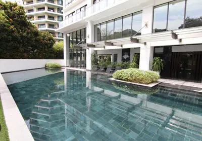 a swimming pool in front of a building at Ken Bangsar By Sleepy Bear in Kuala Lumpur