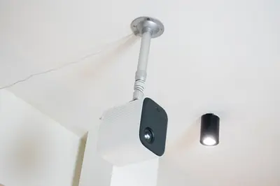 a light hanging from the ceiling of a room at Eko Cheras By Sleepy Bear in Kuala Lumpur