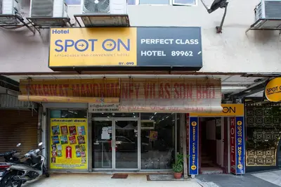 a store front with a sign for a hotel at Hotel O Perfect Class Hotel in Kuala Lumpur