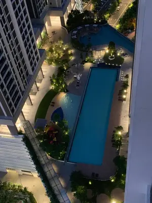 an overhead view of a swimming pool in a building at 2 bedroom apartment at 28 Boulavard in Kuala Lumpur