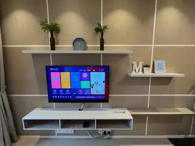 a television sitting on a shelf in a room at ARCORIS, MONT KIARA by MK HOME in Kuala Lumpur