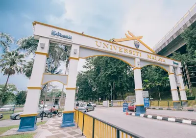 a sign for the university of malaysia on a street at Lily and Loft - KL Gateway Bangsar LRT, WIFI, Netflix in Kuala Lumpur