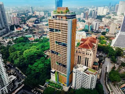 an aerial view of a tall building in a city at Ceylonz Starlight Suites Bukit Bintang in Kuala Lumpur