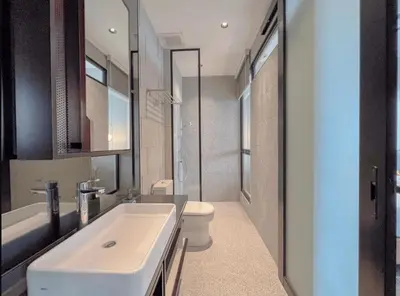 a bathroom with a sink and a toilet at Scarletz Suites KLCC in Kuala Lumpur
