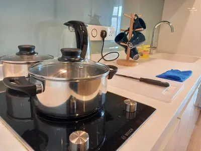 a pot on top of a stove in a kitchen at Yemala Suites at Platinum KLCC in Kuala Lumpur
