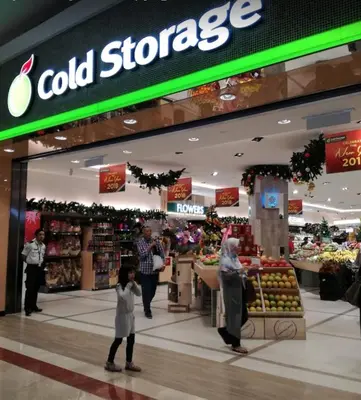 a store with people standing in front of a store at KLCC City SkySuites in Kuala Lumpur