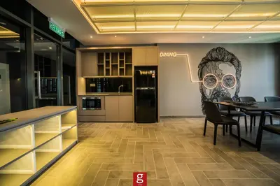 a dining room with a table and a drawing of a face at Ceylonz Suites KLCC Rooftop Infinity Pool KL Tower View in Kuala Lumpur