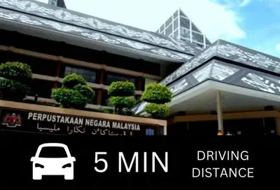 a picture of a building with a car on it at Smile Hotel Chow Kit PWTC in Kuala Lumpur
