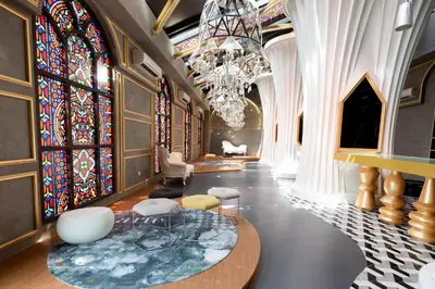 a room with a table and stained glass windows at ARTE MONT KIARA BY PSM Luxury Suites in Kuala Lumpur