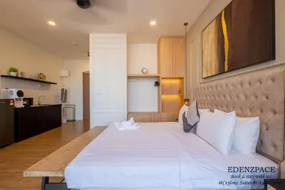 a bedroom with a large white bed in a room at Ceylonz Suites by EdenZpace in Kuala Lumpur