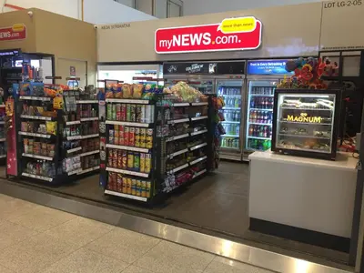 a grocery store aisle with a video game in a store at KLGateway Premium Residence Mid Valley in Kuala Lumpur