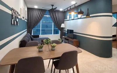 a living room with a table and a couch at Sky Suites KLCC by iRent365 in Kuala Lumpur