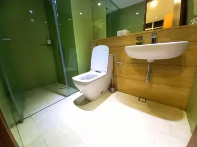 a bathroom with a toilet and a sink and a shower at Vortex KLCC Area in Kuala Lumpur