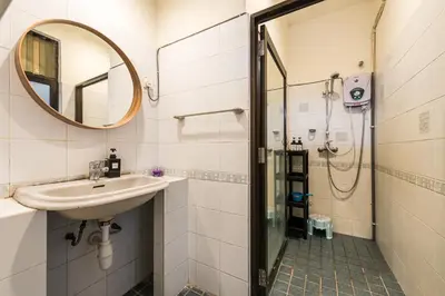 a bathroom with a sink and a shower at 6BR San He Yuan RIAD Private Pool Villa KLCC View by Verano in Kuala Lumpur