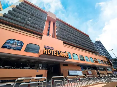 a building with a lot of chairs in front of it at Seeds Hotel Premier Pudu Kuala Lumpur Previously Hotel Pudu Plaza KL in Kuala Lumpur