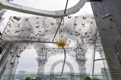 a large white structure with a chandelier in a building at Arte Mont Kiara Homestay in Kuala Lumpur