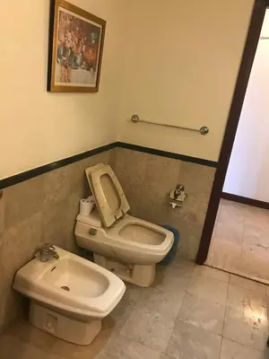 a bathroom with a toilet and a bidet at Fantazya Suites Times Square in Kuala Lumpur