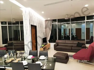 a living room with a couch and a table at KLCC Service suites by Home Sweet Home in Kuala Lumpur