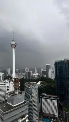 a view of a city skyline with a tower at Sky Suites KLCC by GENESIS in Kuala Lumpur