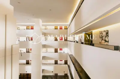 a view of a shopping mall with a sign that reads mallory at D'Majestic Premier Suites Kuala Lumpur in Kuala Lumpur