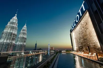 a view of the petronas twin towers from the roof of a building at Ascott Star KLCC Kuala Lumpur in Kuala Lumpur