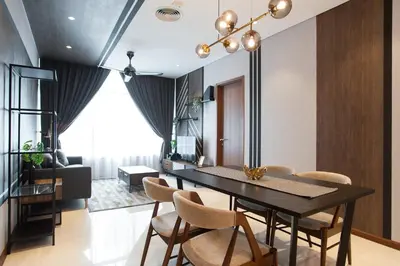 a dining room with a table and chairs at GH KLCC Apartment by GuestHouse in Kuala Lumpur