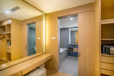 a small bathroom with a sink and a microwave at 188 Suites with Washer and Bathtub near KLCC Kula Lumpur in Kuala Lumpur