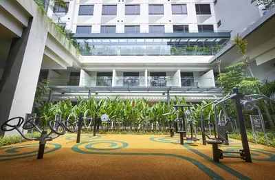 a bunch of bikes parked in front of a building at Hotel Komune Living & Wellness Kuala Lumpur in Kuala Lumpur