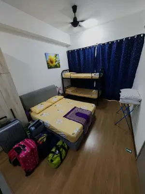 a bedroom with two bunk beds and luggage at ASTORIA AMPANG, 6Pax - Near KLCC, ZooNegara, AmpangPoint Mall in Kuala Lumpur