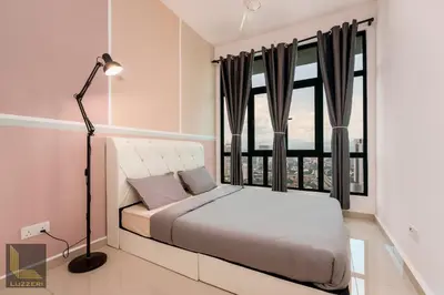 a bedroom with a bed and a large window at Legasi Kampung Baru Guesthouse in Kuala Lumpur