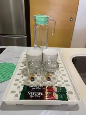 a tray with a blender on top of a counter at Private Jacuzzi Staycation at KL City 1014 in Kuala Lumpur