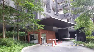 a building with orange cones in front of it at MCity Jalan Ampang KLCC in Kuala Lumpur