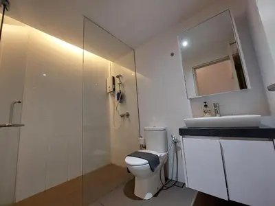 a bathroom with a toilet and a sink at KL Sentral Loft, EST Bangsar #3, LRT in Kuala Lumpur