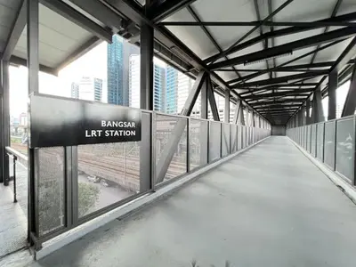 a walkway in a building with a sign that reads canyon left station at KL Sentral Loft, EST Bangsar #3, LRT in Kuala Lumpur