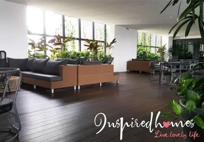 a living room with a couch and some plants at KL Sentral Loft, EST Bangsar #3, LRT in Kuala Lumpur