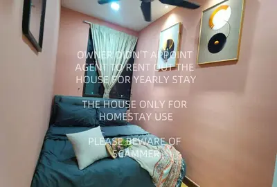 a bedroom with a bed with a sign on the wall at 3min MITEC KL Publika Ocean Classic Condo 2308 in Kuala Lumpur