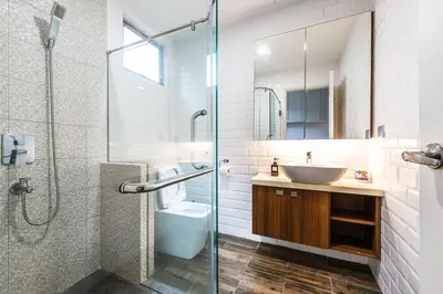 a bathroom with a sink and a glass shower at 25P Enchanting Bungalow Retreat - Mystical Garden,Petaling Jaya by Verano in Petaling Jaya