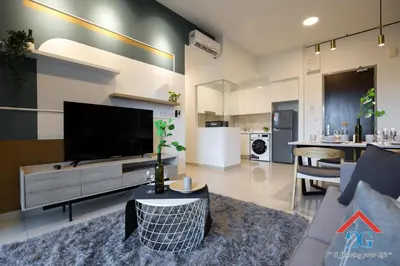 a living room with a flat screen tv and a couch at Astoria Ampang in Kuala Lumpur