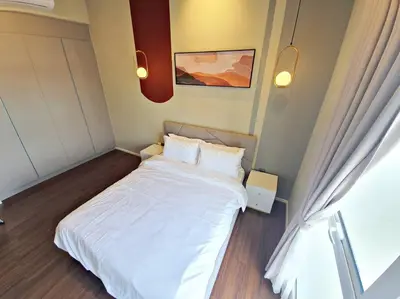 a bedroom with a white bed in a room at ※THE UNIQUE HOME @ KL※ SUNWAY VELOCITY-TRX ◆2-7PAX in Kuala Lumpur