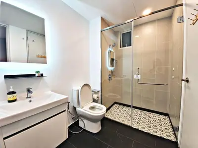 a bathroom with a shower and a toilet and a sink at ※THE UNIQUE HOME @ KL※ SUNWAY VELOCITY-TRX ◆2-7PAX in Kuala Lumpur