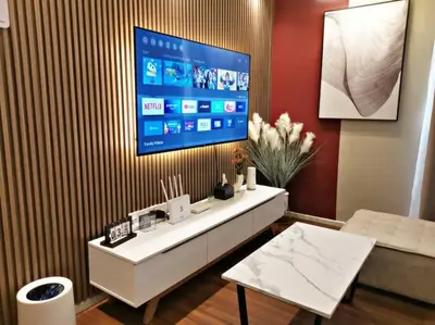 a living room with a large tv on a wall at ※THE UNIQUE HOME @ KL※ SUNWAY VELOCITY-TRX ◆2-7PAX in Kuala Lumpur