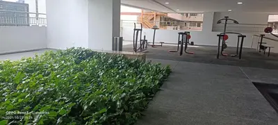 a group of plants in a room with fitness equipment at Legasi Kampung Baru apartment by rumahrehat in Kuala Lumpur