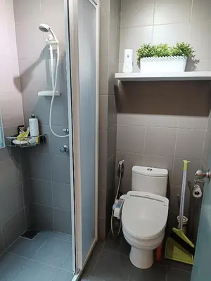a small bathroom with a toilet and a shower at KLCC Gem walk to all in Kuala Lumpur