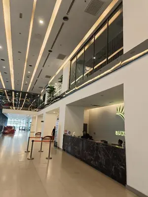 a lobby of a building with a bar in it at KLCC Gem walk to all in Kuala Lumpur