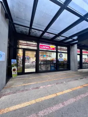 a store front of a store with glass doors at New Arcoris 6 Pax 2 BR with Pool View Mont Kiara - BOHO in Kuala Lumpur