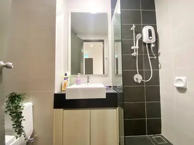 a bathroom with a sink and a shower at Lily and Loft - Queensville @ Kuala Lumpur - Netflix in Kuala Lumpur