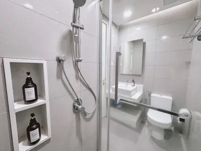 a bathroom with a shower and a toilet and a sink at TRX Garden View TriBeCa 3min walk2 Pavillion 2bedroom in Kuala Lumpur