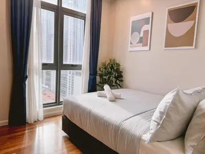 a bedroom with a bed and a large window at TRX Garden View TriBeCa 3min walk2 Pavillion 2bedroom in Kuala Lumpur