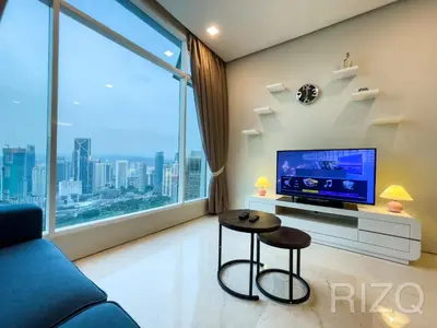a living room with a tv and a large window at SOHO SUITES KLCC by Wonder Home in Kuala Lumpur